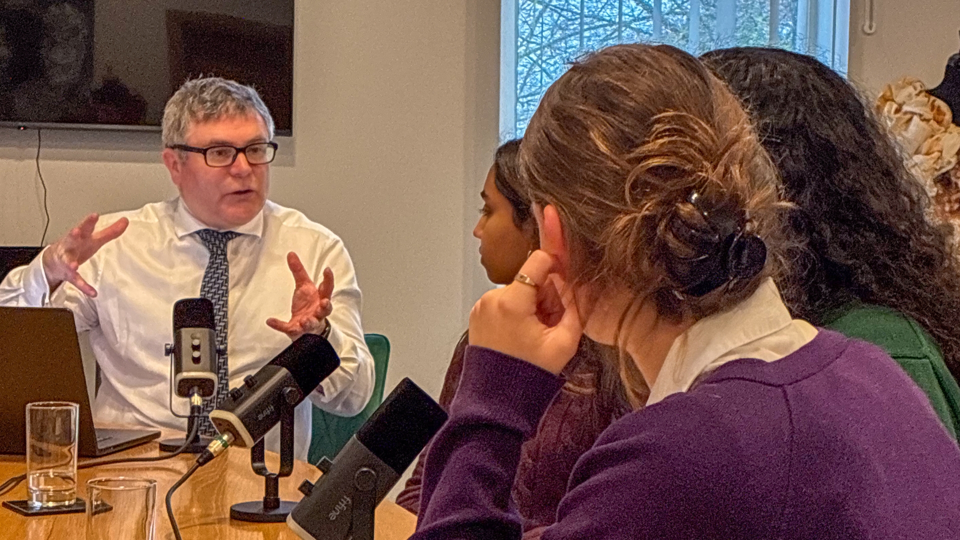 Students and teachers discussing the ethical use of AI in school